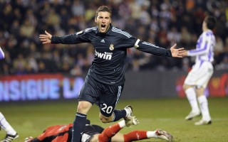 竟彩网首页-皇家社会主场迎战马德里竞技，保级斗志与冠军雄心的西甲碰撞